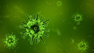 Microscopic green virus particles floating in a dense, glowing field, symbolizing how distorted data and statistics spread like contagion.